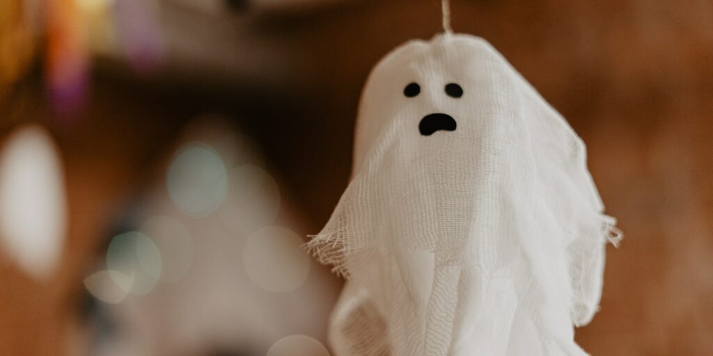 Halloween decoration. Cute little handmade ghost. Fall festive season