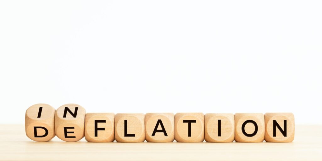 Inflation or deflation word in wooden blocks