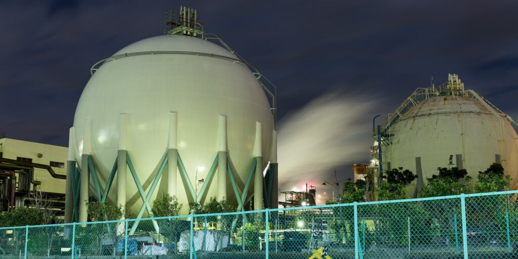 Natural Gas storage tanks at night