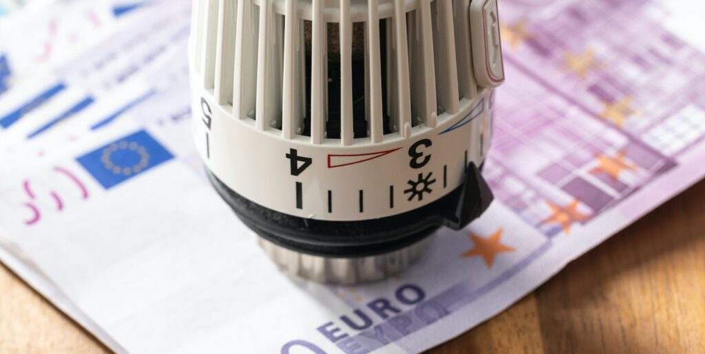 Thermostatic head and Euro money. Euro banknotes.