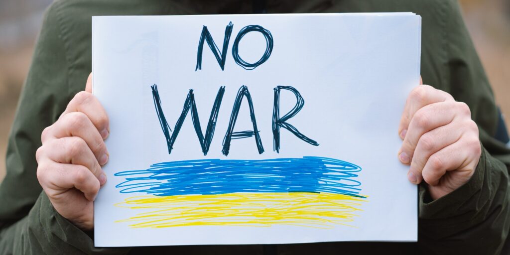 War of Russia against Ukraine. Crying boy asks to stop the war in Ukraine.