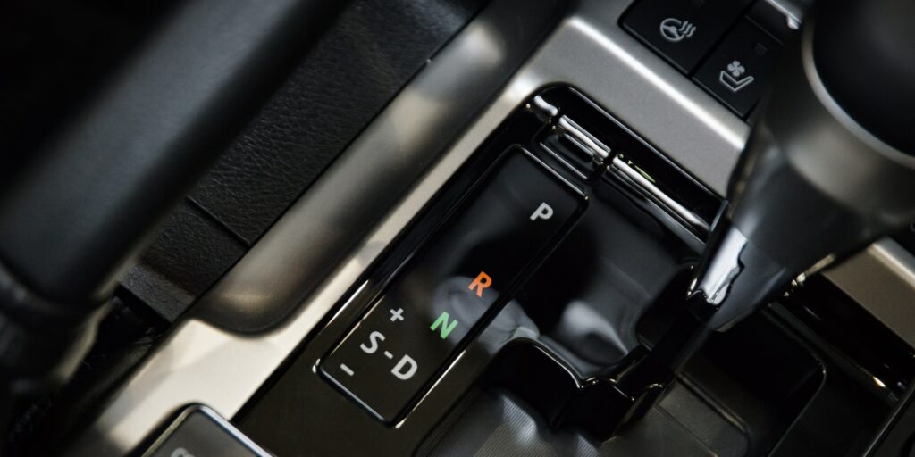 automatic transmission gear stick in modern car interior