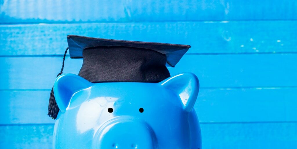 College graduate student diploma piggy bank