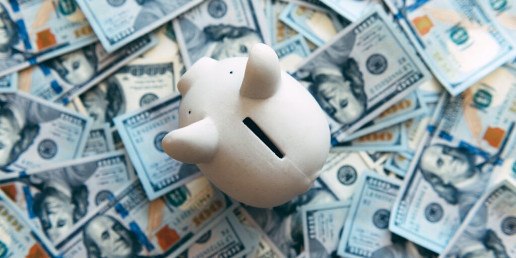Piggy moneybox with dollar cash