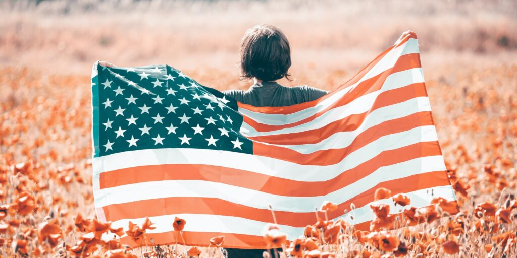 USA citizen with american flag. 4th of July. Freedom. Independence Day. Memorial day.