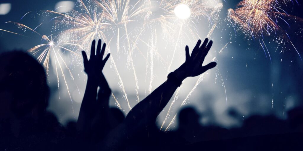 Cheering crowd and fireworks