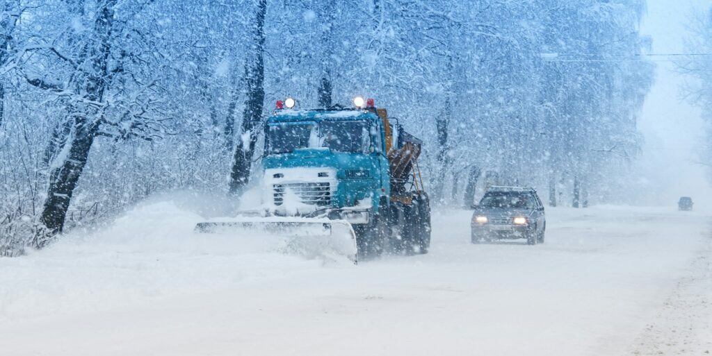 snow plow doing snow