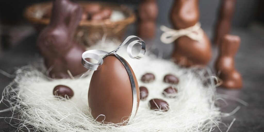 Delicious chocolate Easter egg with a ribbon