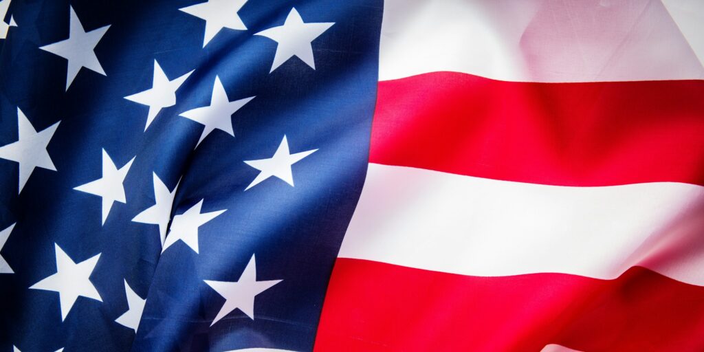 USA flag background.