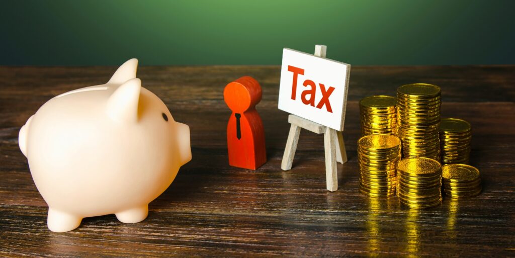 Piggy bank is asked to pay taxes.