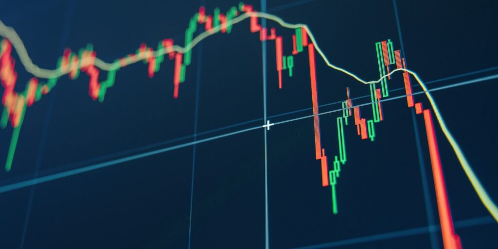 Diagram representing red crashing market volatility of crypto trading on blue display background