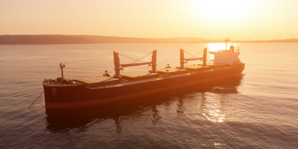 Large general cargo ship tanker bulk carrier, Top down aerial view.