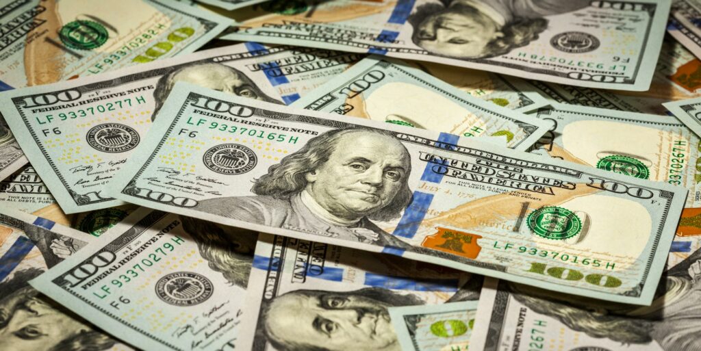 Background of hundred dollars bank notes