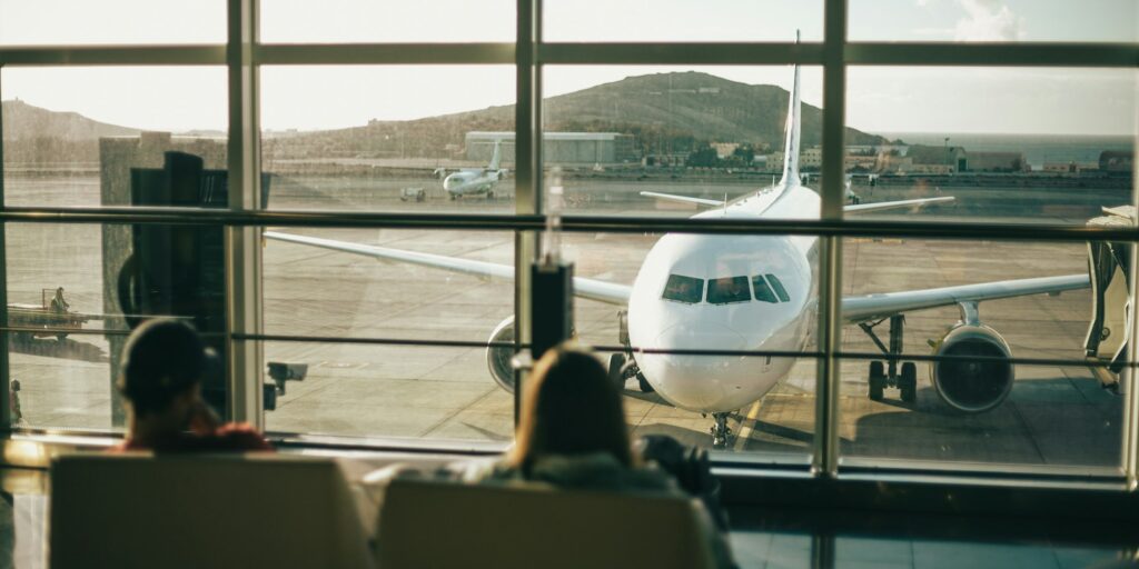 At the airport, a plane through the airport window