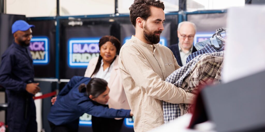 Black Friday shopper buying clothes