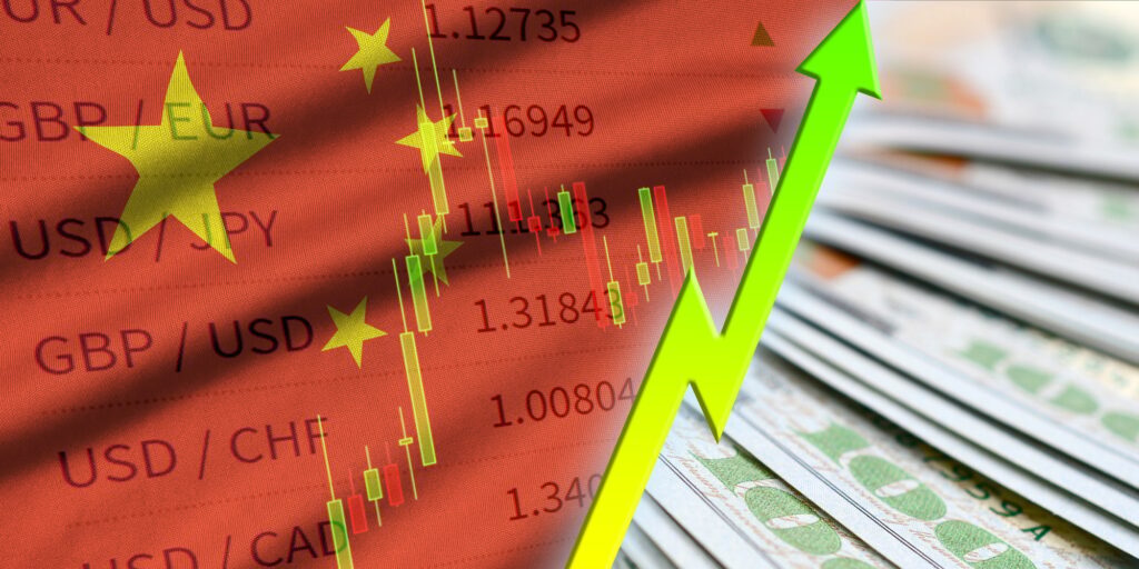 China flag and chart growing US dollar position with a fan of dollar bills