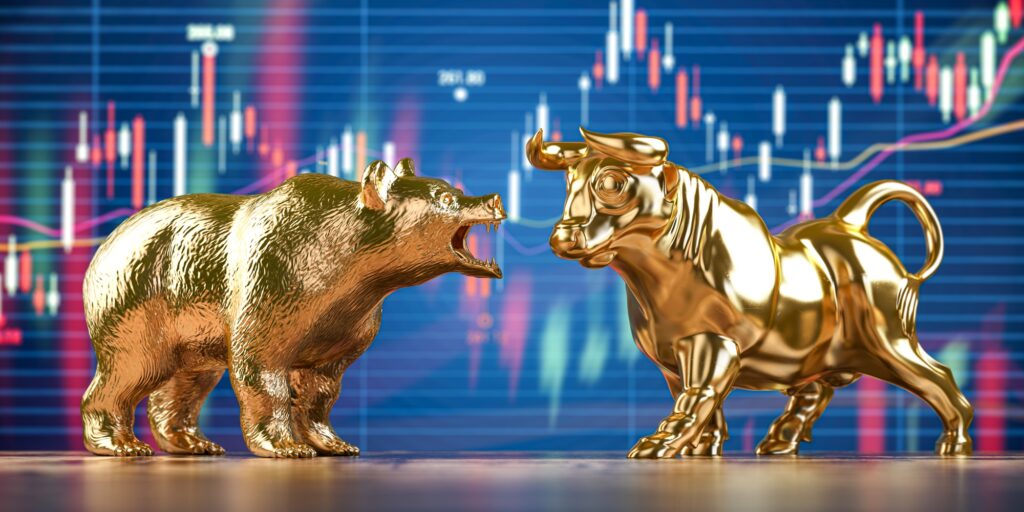 Golden bull and bear on stock data chart background. Investing, stock exchange financial