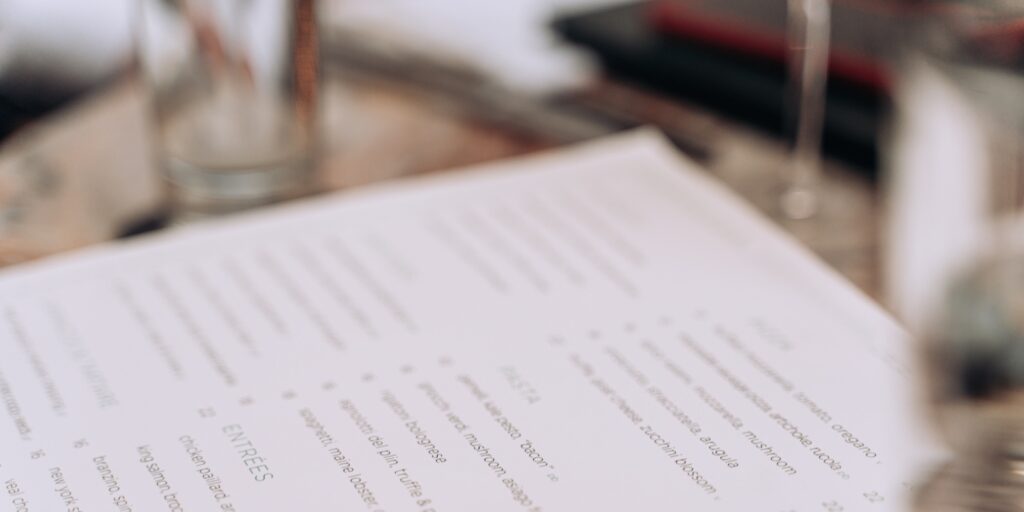 Italian restaurant menu on dinner table