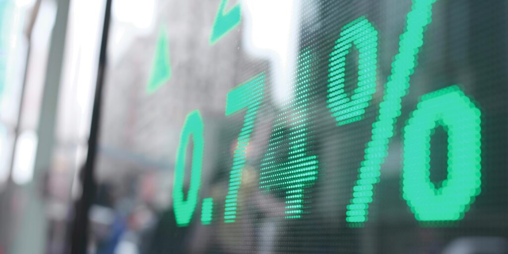 Stock market screen showing prices in city