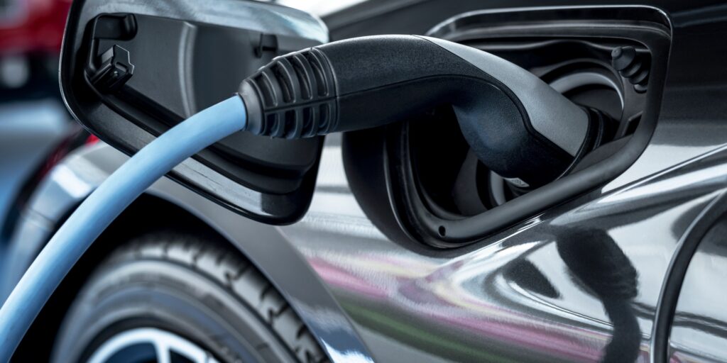 Electric car at charging station