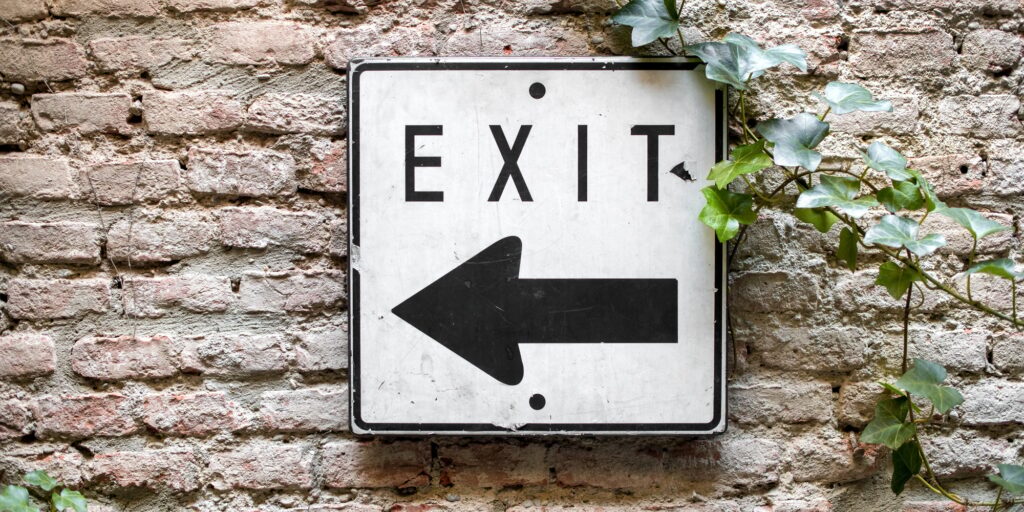 Exit direction sign pointing to the left