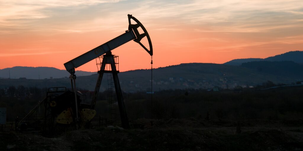 oil pump on sunset