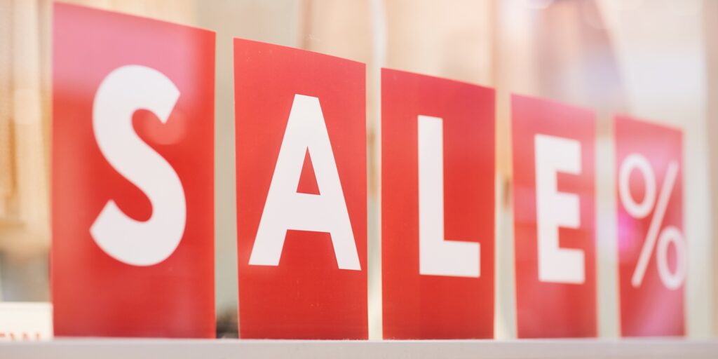 Sale Sign in Clothing Boutique