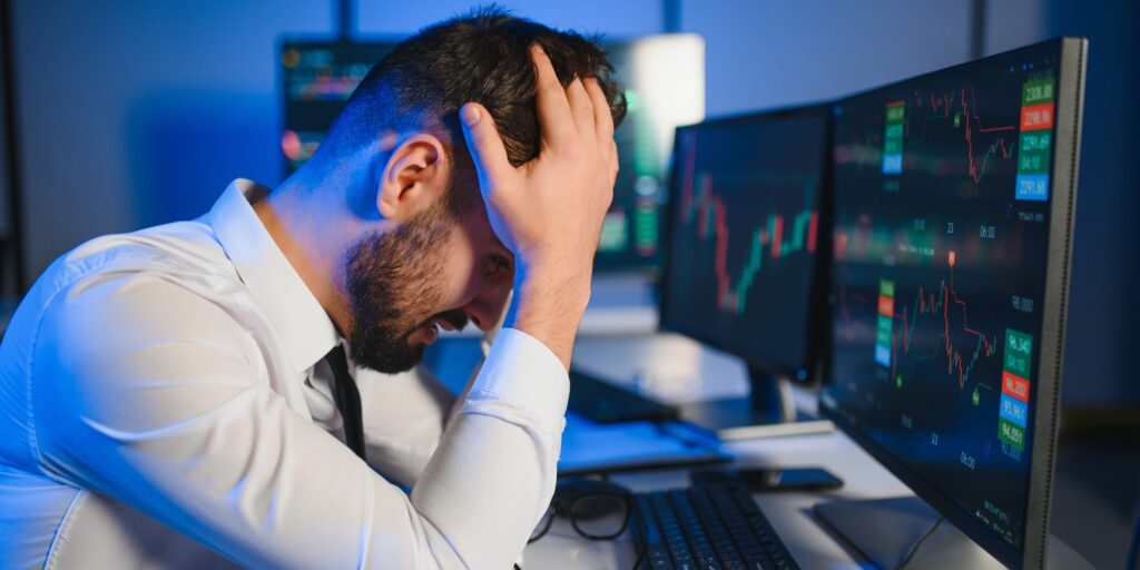 Intraday trader angry over loss in stock market investment while trading.