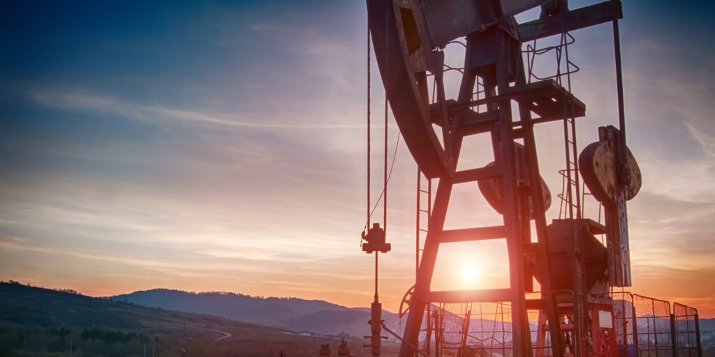 oil pump on sunset