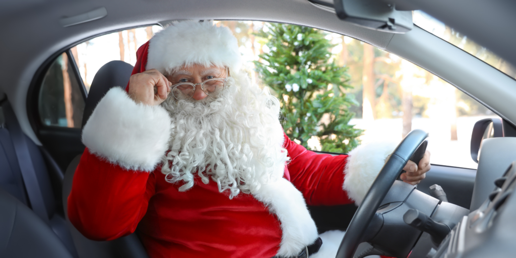 Kerstman in auto_Canva