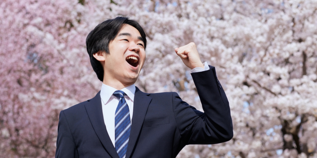 Businessman celebrating - Canva